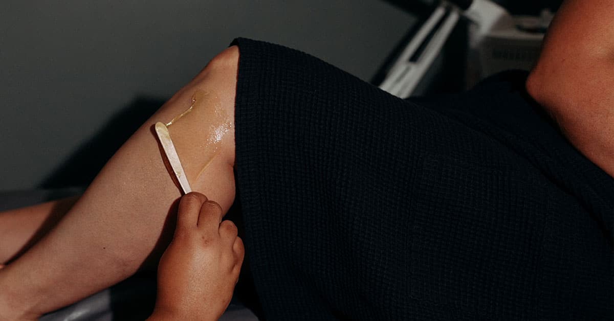 a close up of a person wearing a shirt and tie